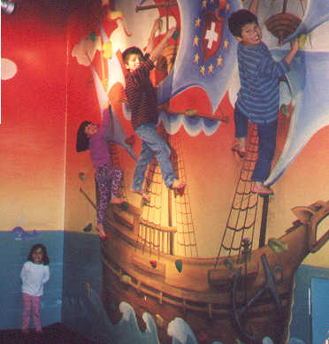 Children climbing the wall